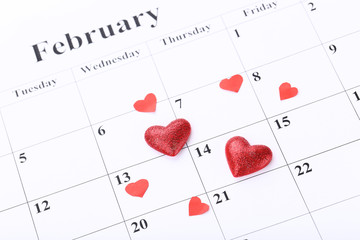 Valentine day calendar with red hearts