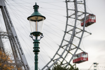 Lamp in front of Wiener Riesenrad on a cloudy day in winter