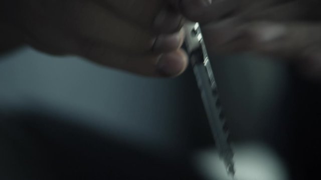 preparing herion needle for drug use