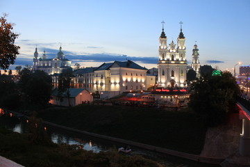Fototapeta na wymiar View of the Resurrection Church , Assumption Cathedral and Vitba river in Vitebsk.
