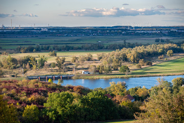 Fototapeta premium Green hills under a blue sky with clouds in Valley of Love, Poland.