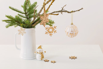 modern Christmas sill life in jug with snowman on white backgrou