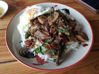 Stir fried beef with fried egg