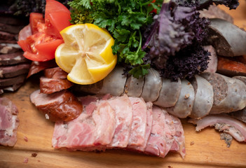  tray with roasted meats, black pudding and sausage