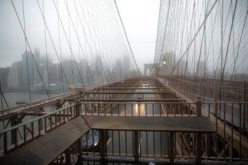 Brooklyn bridge under the rain and mist