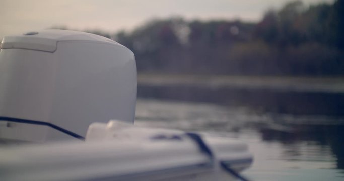 Close up of motor boat front bow as it gently floats in still water