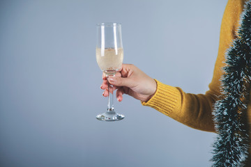 woman hand a glass of champagne