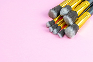 Make brush powder. Drawing cosmetic products isolated on pink ba