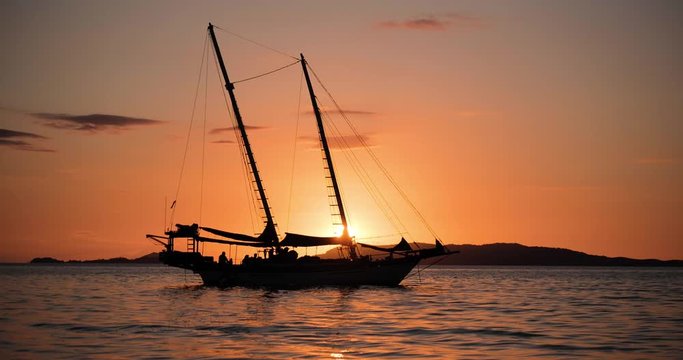 Footage of a boat during a beautiful sunset. Shot in 4k.
