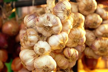Hanging Garlic Bulbs and Onions