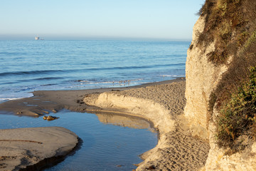 Estuary water flowing into the ocean