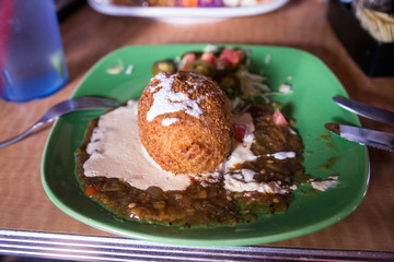 Fototapeta na wymiar Traditional arabic plate of falafel with tahini