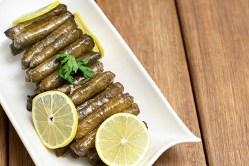 turkish stuffed grape leaves in white plate