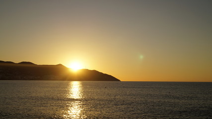 Naklejka na ściany i meble Sonnenaufgang an der Küste Spaniens