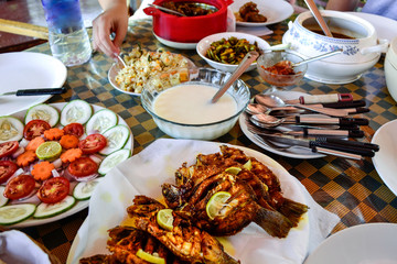 Traditional tandoori Fish from Kerala, India, and other dishes