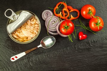 Canned Tuna Fish. Fishing industry. Pieces of Tuna with chilli. Healthy food. Fish can.