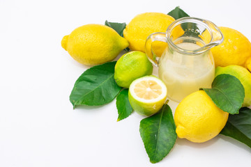 top view of natural lemons and lemon juice isolated