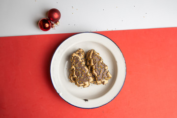 Christmas tree-shaped Christmas cookie with chocolate