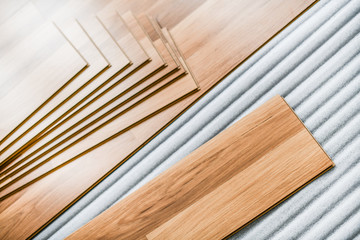 Timber laminate floor. Wooden floors boards top view. House interior room  renovation.