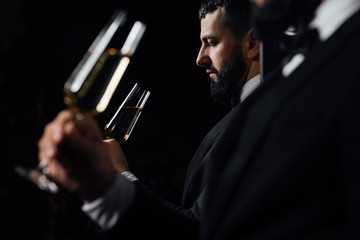 man with glass of wine