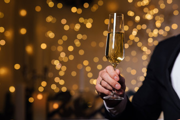 man with glass of champagne
