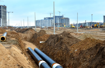 Laying underground storm sewers at a construction site. Groundwater system for new residential...