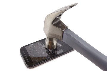 broken phone with hammer isolated on white background, crash phone, fractured