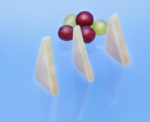 Wedges of cured Manchego cheese.