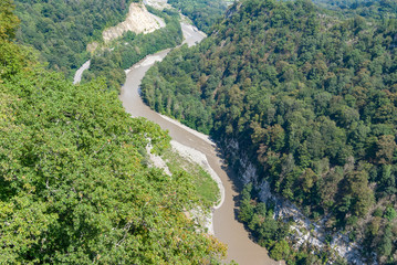 Fototapeta na wymiar mountain fast bubbling river, river flow, top view