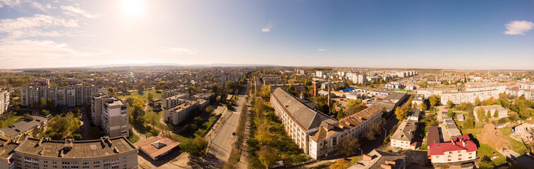 Fototapeta na wymiar 180 degrees landscape of urban area. Aerial drone view cityscape. Older European town Drohobych, Ukraine