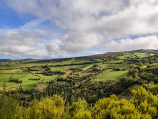 Fototapeta na wymiar On the Camino of Santiago, view of green hills of Galicia