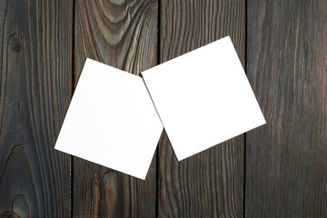 Two square blank cards (business cards, tickets, flyers, invitations, coupons, banknotes, etc.) on...