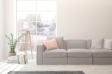 Stylish room in white color with sofa and winter landscape in window. Scandinavian interior design. 3D illustration