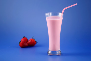 Strawberry milkshake, sweet drink made with cow's milk.