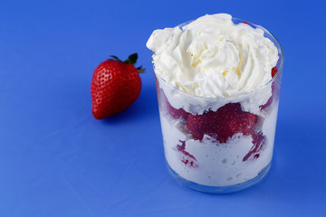 Strawberries with cream, very sweet and creamy dessert.