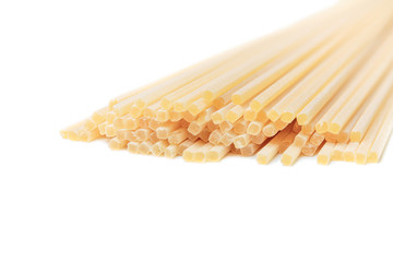 macaroni unprepared raw rope tied spaghetti from durum wheat handmade isolated on white background top view