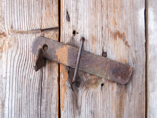the old-fashioned latch on the door, the old castle, retro style
