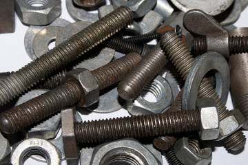 Collection of Old Bolt, Screws, Nuts Engineering Metal Tools on White Background