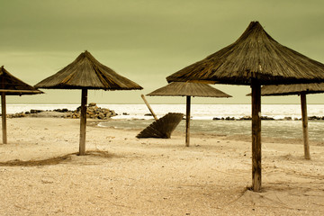 Straw umbrellas in the winter