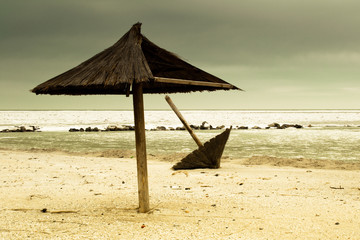 Straw umbrellas in the winter