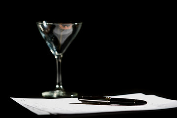 Some hands write on paper