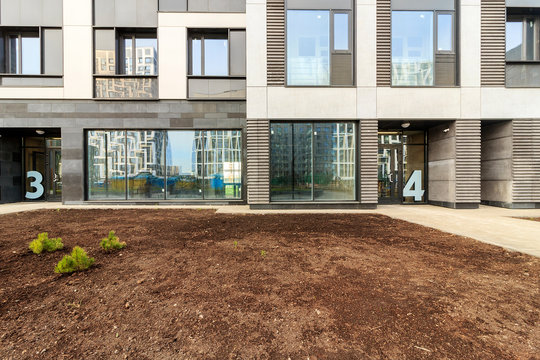 Panoramic window of modern residential building view outside. Insulating glass (glazing, pane). Storm windows. Ground floor apartment. first for shops, offices. commercial premises. Rainscreen. Door