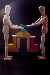 Mannequins and architectural game pieces