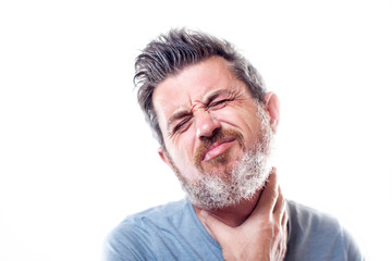 Obraz premium Man feels strong throat pain isolated. People, healthcare and medicine concept