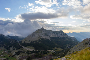 Fototapeta na wymiar Mountain view on the hydrometeorological station in Lovcen national park at sunset, Montenegro