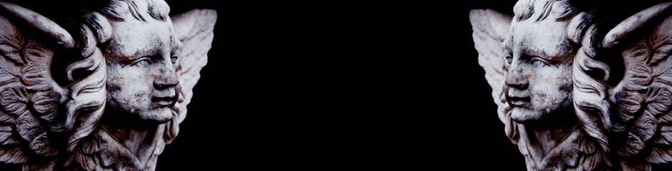 Angels. Ancient statues and free space for text