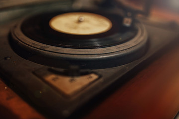 vinyl record on the player retro style.