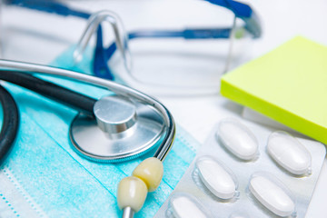 medical drugs, stethoscope. Hospital treatment concept.