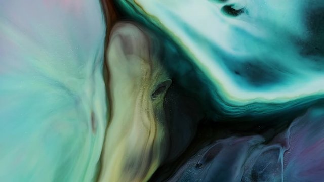Abstract ink swirl background. Fantastic structure of colorful paint. Liquid color ink explosion. Macro shooting 4K UHD footage
