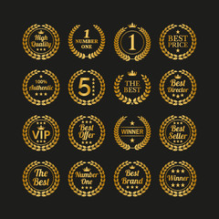 Naklejka premium Set of golden laurel wreaths on black background.